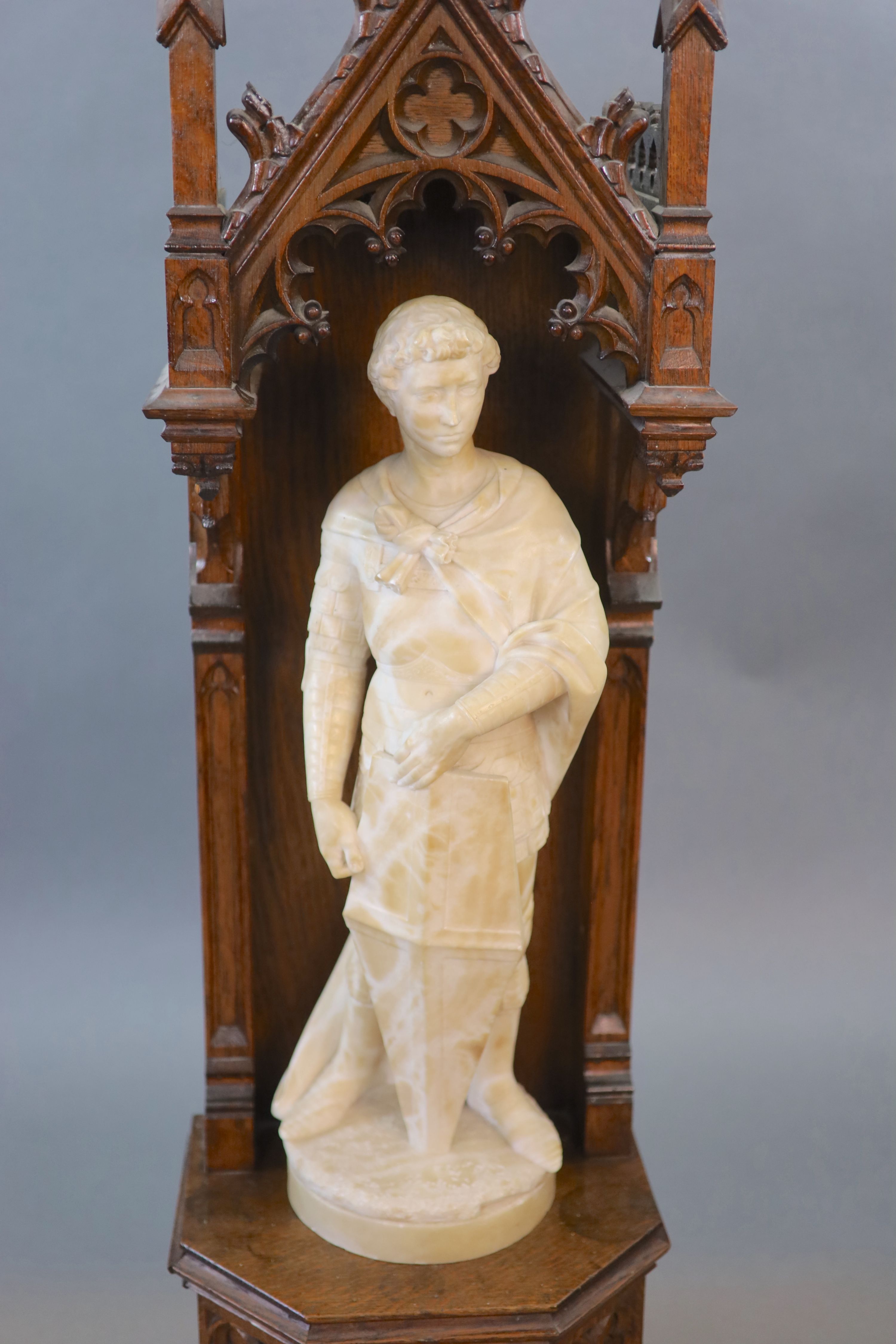 A carved white marble study of a romantically portrayed crusader, 19th century 117 cm high (combined)